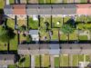 UK house prices edge down in June, Halifax says